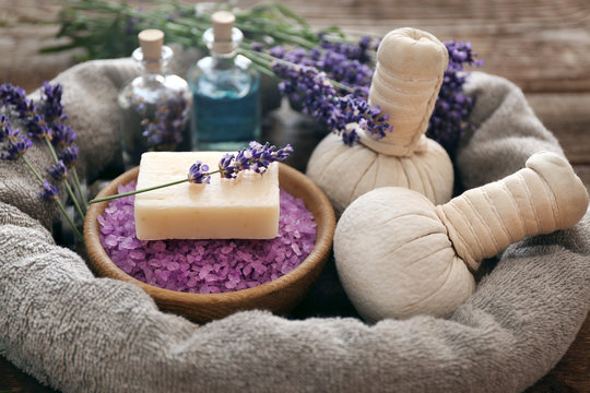 Beautiful spa composition with lavender on wooden background