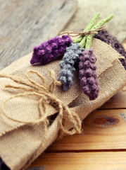 Fototapeta premium Handmade gift, knitted lavender flower