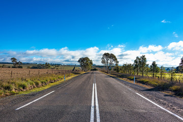 Australian outback road. Rural road on sunny day. Myrtleville, NSW, Australia