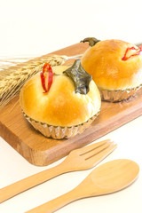 Chicken Green Curry bread on wooden plate isolated on a white background