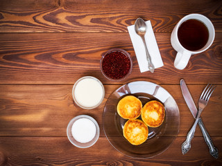 Tea set for breakfast on the table. View from above
