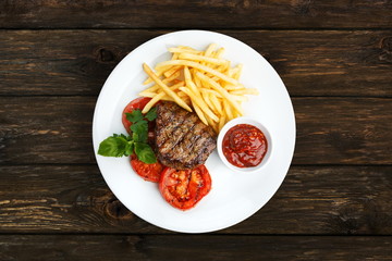 Restaurant food - beef grilled steak with french fries