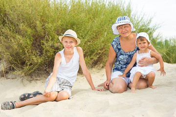 Grandmother playing with her grandchildren