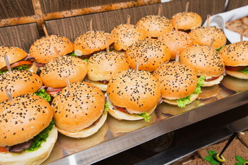 Catering at event - served table with hamburgers snack
