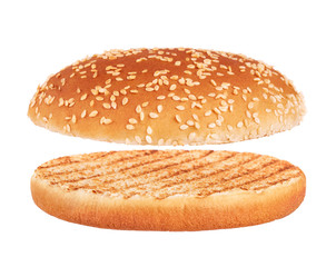 Grilled burger bun isolated on white background.