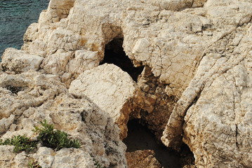 extremely weathered sandstone / cracked rocks on the coast of Cyprus