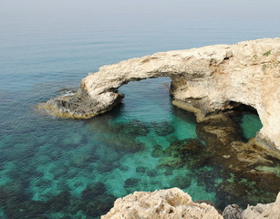 bizarre rocks on the surf line / weathered rock on the coast of Cyprus