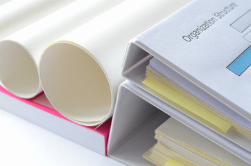 document files and roll of white papers with high key tone,office supplies.