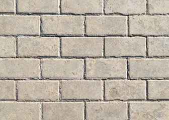 Background in form of gray masonry of lime sand bricks