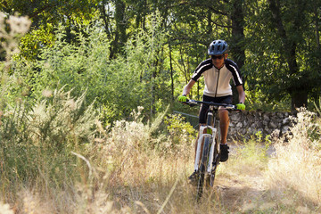 Naklejka premium cycling with mountain bike outdoor