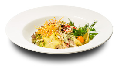 Meat salad decorated with cape gooseberry and karamboloy.Na white plate and a white background