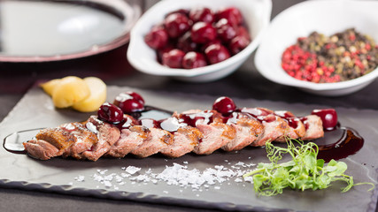 Spanish cuisine. Duck breast with pears