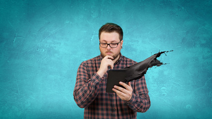 Hipster guy with tablet device . Mixed media