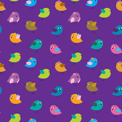 Seamless background with multi-colored bright cute birds