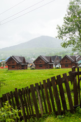Fototapeta na wymiar Ladscape of village houses and mountain