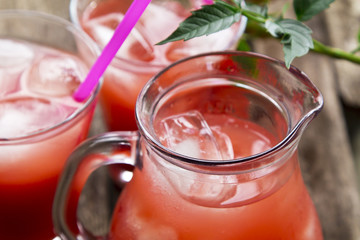 watermelon juice on wooden background