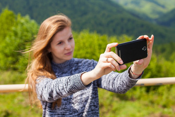 Woman is doing selfie
