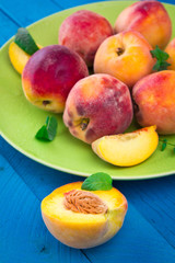 Ripe peaches on a plate
