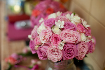 Bouquet of pastel pink roses decorated with silver pearls