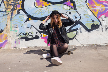 Young girl with the skateboard