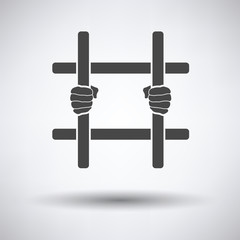 Hands holding prison bars icon