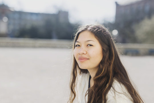 Portrait of smiling woman outdoors
