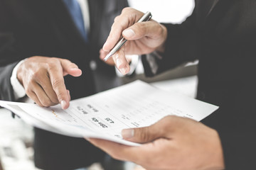 Business people discussing the charts and graphs showing the res