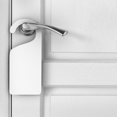 Door knob with blank doorhanger mock up. Empty white flyer mockup hang on door handle. Leaflet design on entrance doorknob. Dont disturb sign. Hotel room clear hanger. Do not disturbing signal.