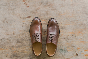 leather shoes on wood background
