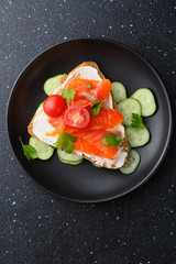 Salmon and cheese bruschetta with cucumber