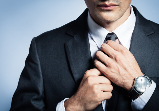 Male fashion and clothing.  Close up of man in suit.