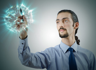 Businessman pressing virtual buttons in futuristic concept