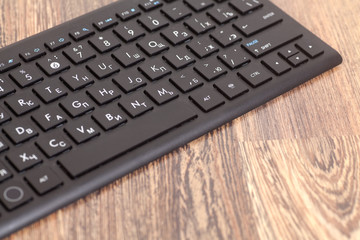 Computer Keyboard On Wooden Background
