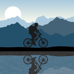Silhouette of a man riding a bike