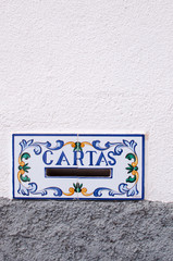 old mailbox hand painted in a village
