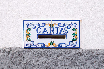old mailbox hand painted in a village