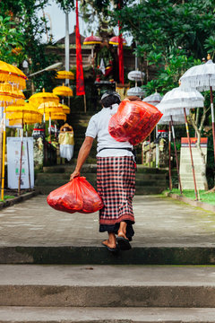 Man in traditional balinese clothes