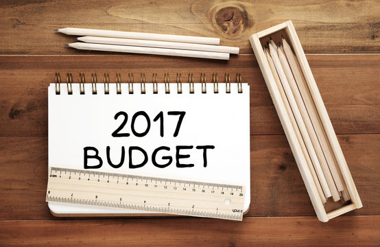 2017 budget word on notebook paper background, financial concept