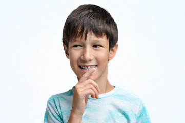 Portrait of a smiling boy on a white background