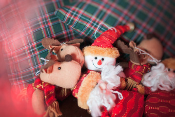 Christmas decoration with garland, tree branch and toys