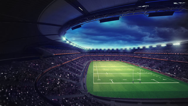 rugby stadium with fans under roof with spotlights