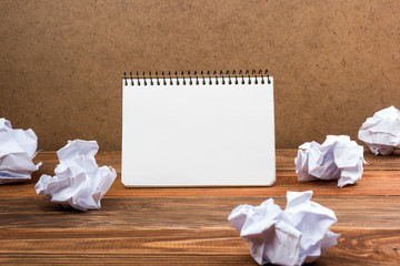 White blank paper notepad book at office worplace. Copy space