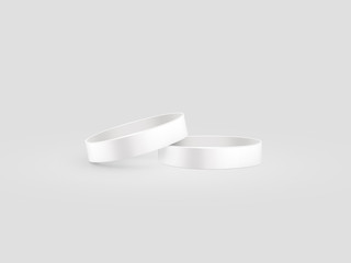Blank white rubber wristband mockup, clipping path, 3d illustration. Clear sweat band stack mock up design. Sport sweatband pile template. Silicone fashion round social bracelet. Unity band.