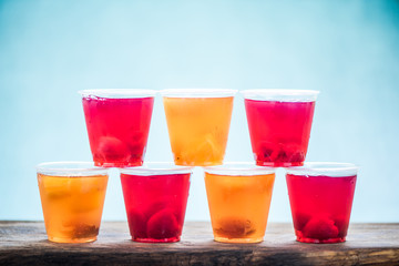 jelly with fruit pieces in cups
