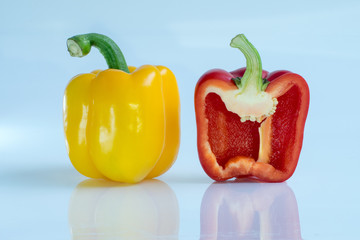 big pepper slice with seeds on white background
