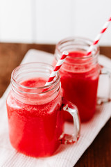 Healthy watermelon smoothie on a wood background. Freshly blended watermelon Smoothies.