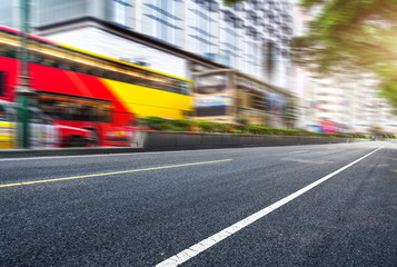Fototapeta premium blurred traffic in downtown district,hong kong,china.Chinese characters on road are all traffic roadmarking.