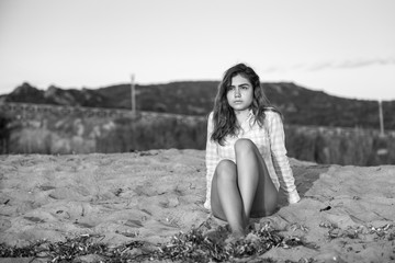 Teen girl portrait on the beach at sunrise