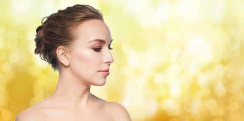Fototapeta premium beautiful young woman face over white background