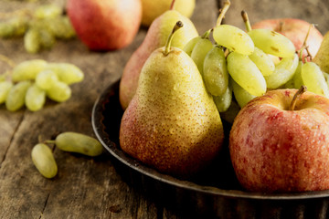 Crop Plate with pears and apples. Autumn fruits.